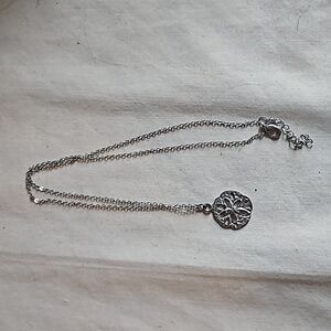 Silver sand dollar charm necklace